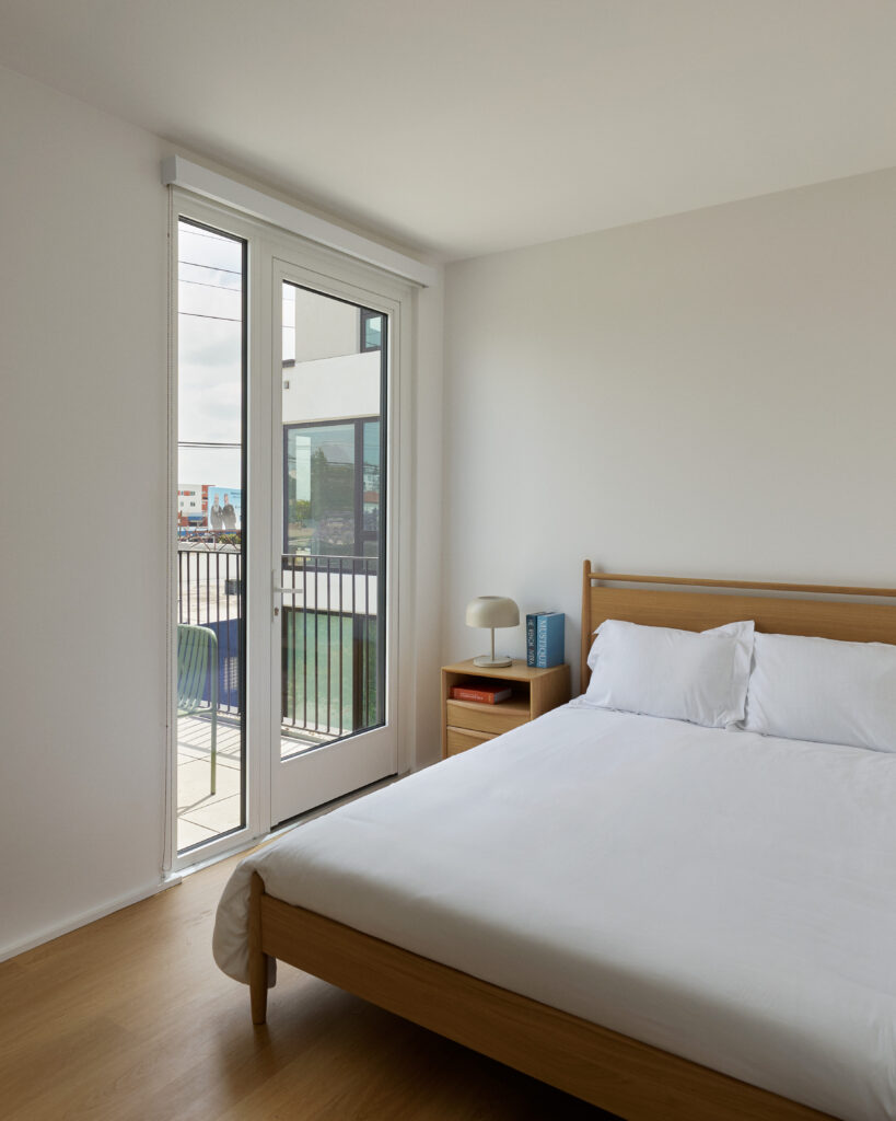Furnished bedroom at Comma Barrington.